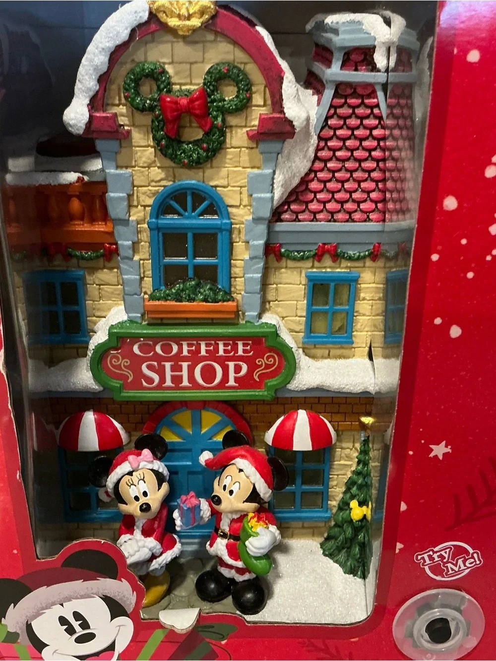 Disney x Aldi limited edition coffee shop Disney village lights up Minnie Mickey